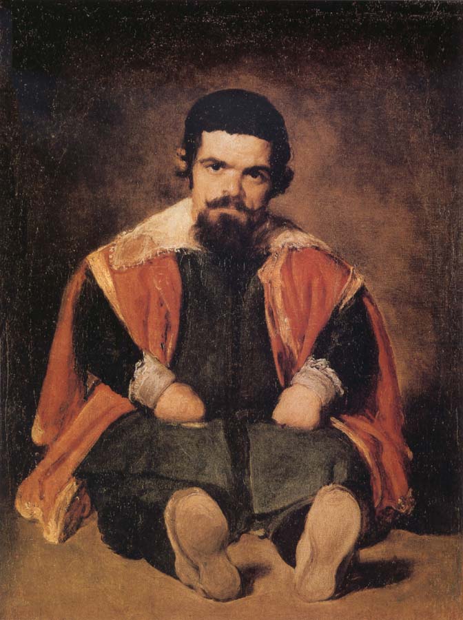 A Dwarf Sitting on the Floor
